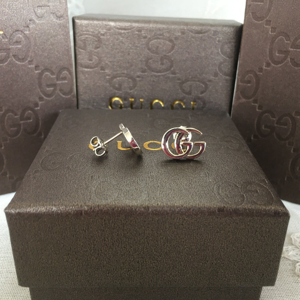 G u c c I earrings