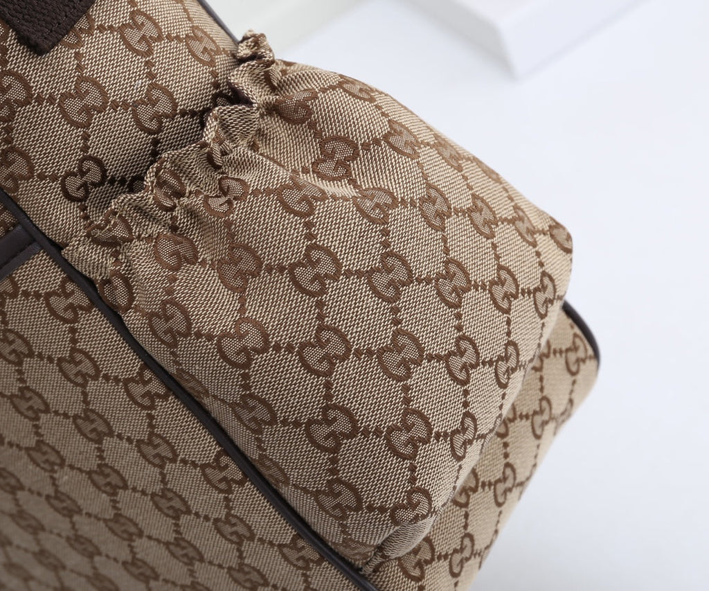 G u c c I baby bag